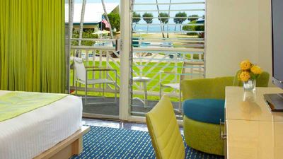 Renovated guestrooms at Kauai Shores feature cheery retro-modern decor. // © 2014 Aqua Hospitality 3