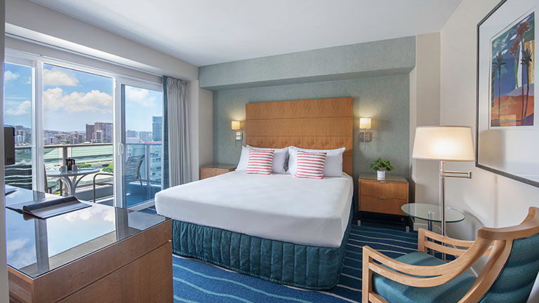 The comfortable One-Bedroom Mountain View Suite includes a balcony that showcases Hawaii's stunning mountain views.