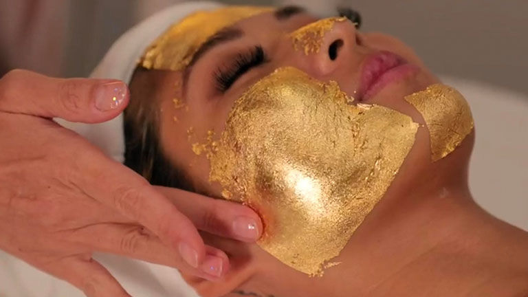 Clients can indulge in a 24K Gold Foil facial.