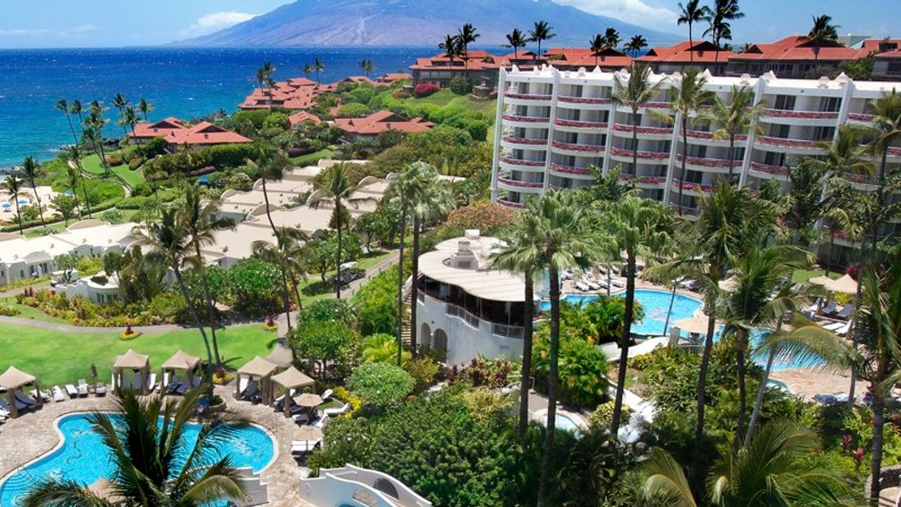 Turtle Bay offers Wet Sweat, a high-energy exercise class held on the beach. // © 2013 Turtle Bay Resort F