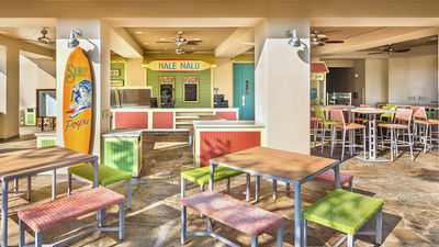 Grand Hyatt Kauai’s new Hale Nalu restaurant, located poolside, sports a surf shack vibe. // © 2015 Grand Hyatt Kauai Resort and Spa