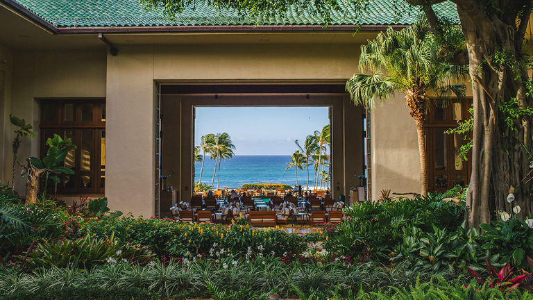 Taking advantage of Grand Hyatt Kauai's open-air design, Seaview Terrace is a prime spot for sipping cocktails, watching the sunset and enjoying live Hawaiian music.