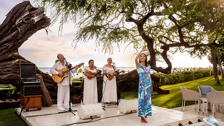 Halekulani hosts live music and hula.