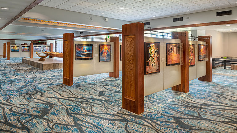 Forty lithographs by the late Herb Kawainui Kane are displayed in the foyer off the lobby.