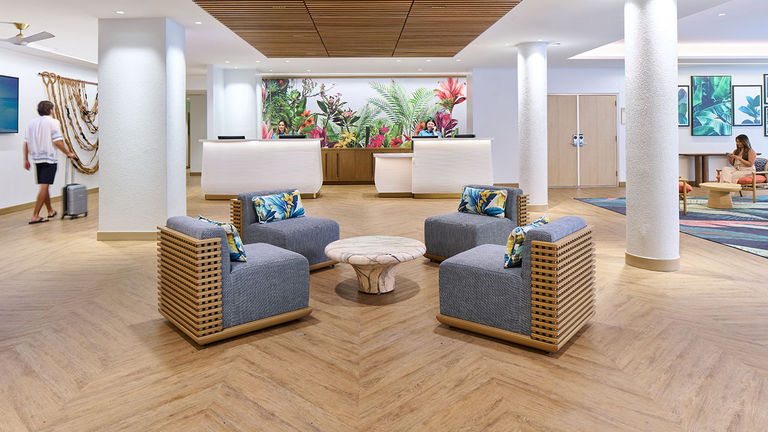 The lobby features a mural by artist Kamea Hadar.