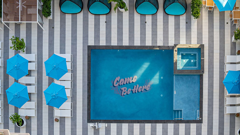 Guests can relax at the hotel’s stylish pool.