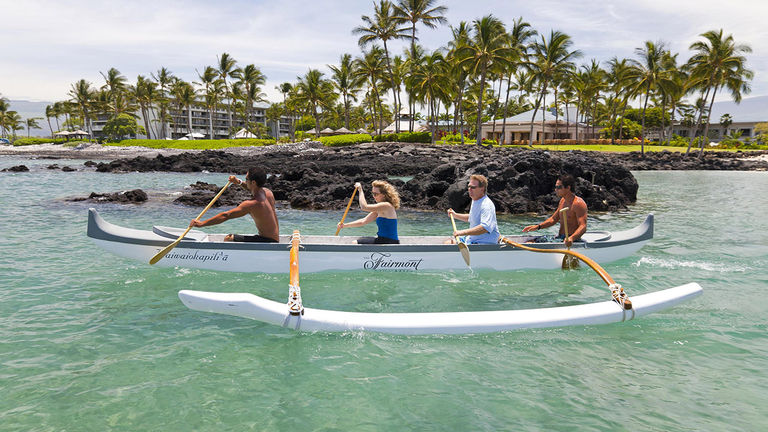 Fairmont Orchid’s Hui Holokai ambassadors share ancient Hawaiian traditions such as outrigger canoe paddling.