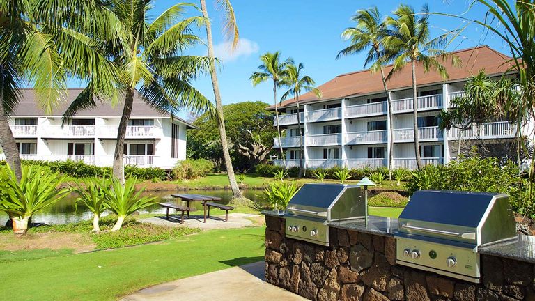 Strategically placed barbecue areas invite Kiahuna guests to mingle while firing up their meals outside.