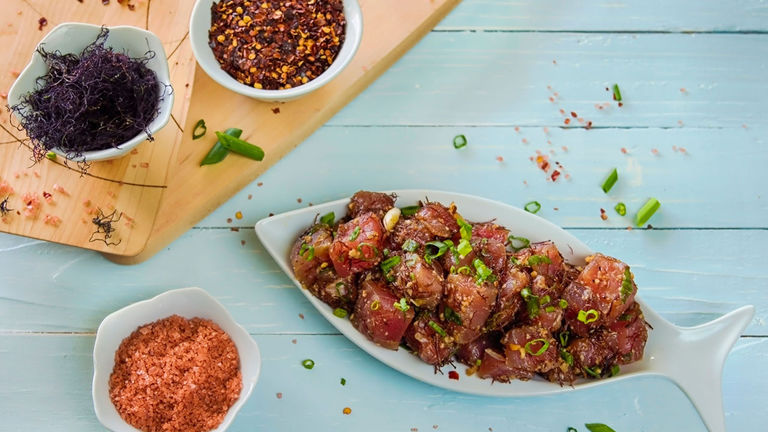 Guests learn how different types of salt can dramatically alter the flavor of fresh ahi poke.