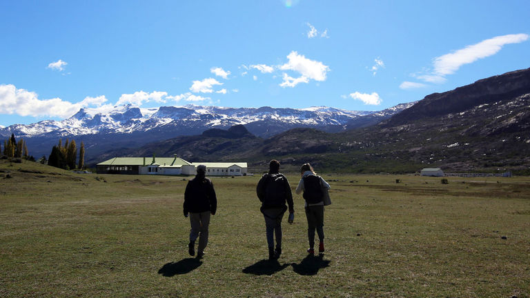 Guests make the walk from the lake to the property.