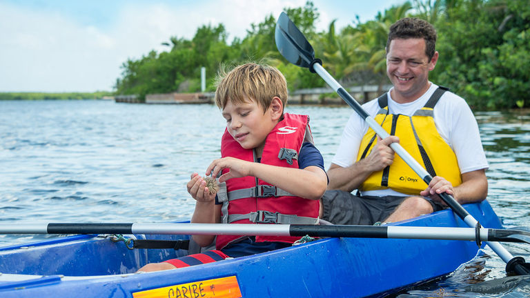 Guests of The Ritz-Carlton, Grand Cayman can learn about marine life while kayaking.