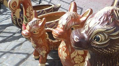 Local shops specialize in handmade items, such as these burro pots. // © 2017 Mark Rogers