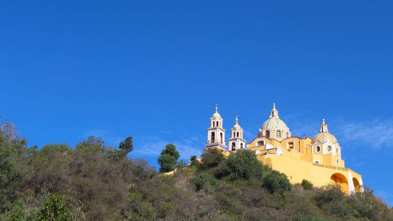 Clients might take a day trip to the nearby town of Cholula.