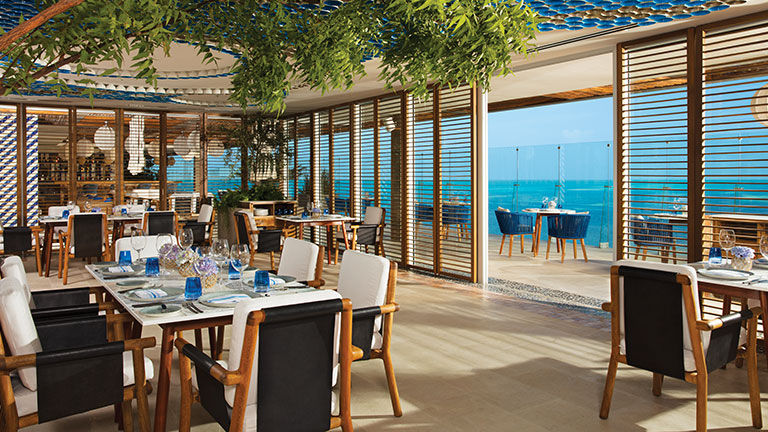 Bluewater Grill serves Mediterranean-fusion food with scenic views of Cancun. Bluewater Grill serves Mediterranean-fusion food with scenic views of Cancun.