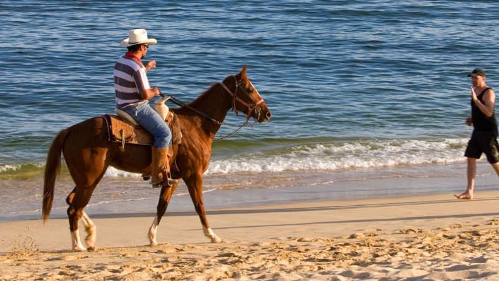 Los Cabos Lover’s Beach is known for being one of the town’s more secluded beach spots.  // © 2013 Los Cabos Convention & Visitors Bureau F