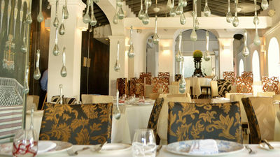 The beautiful Cafe de Artistes is a culinary favorite with international food and a lush patio for alfresco dining. // © 2014 Cafe de Artistes