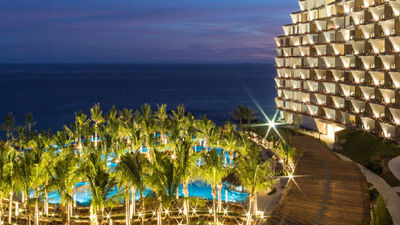 The resort’s curved walls are meant to resemble sails. // © 2017 Grand Velas Los Cabos 2