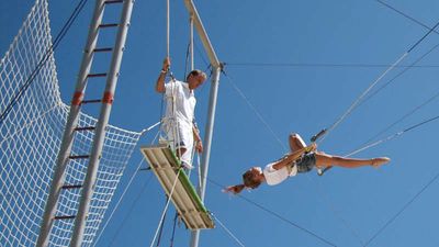 Brave guests can try their luck on a flying trapeze. // © 2015 Megan Leader