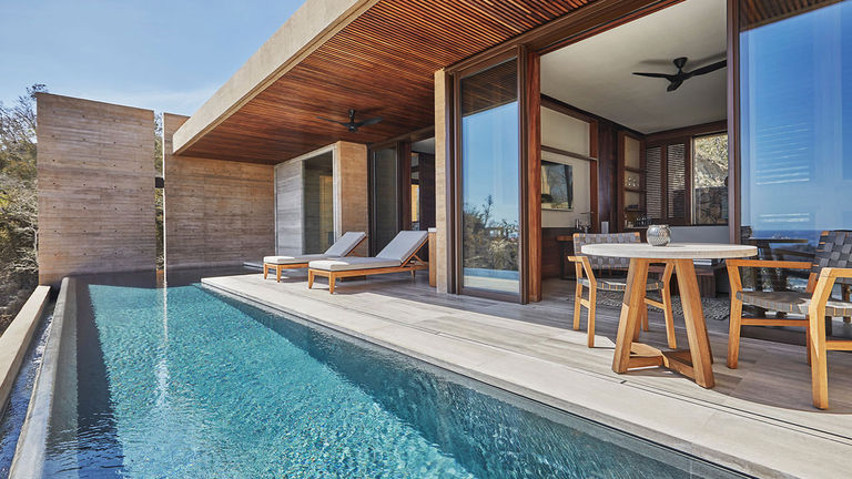 The property offers 63 suites, many with private infinity pools.