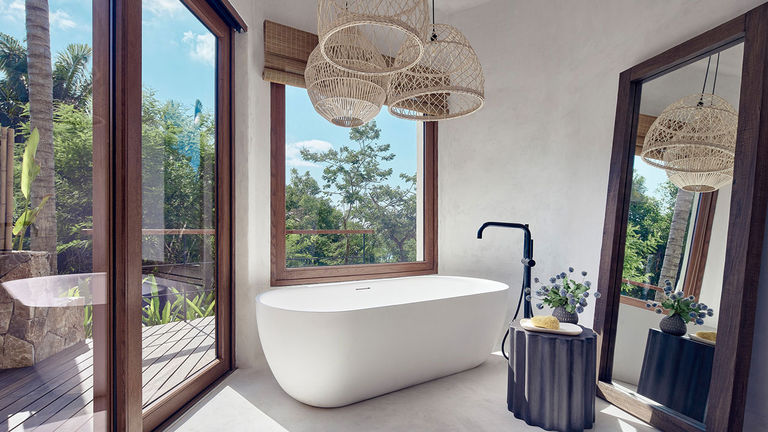 Bathrooms have jetted tubs, but there are also outdoor showers.