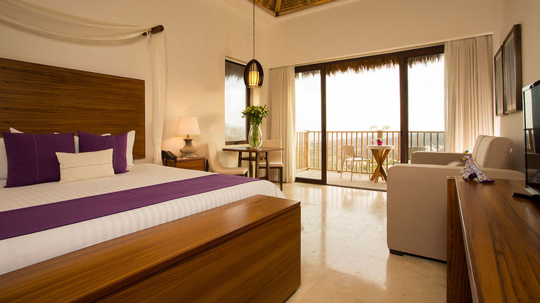 Many guestrooms feature jungle views.