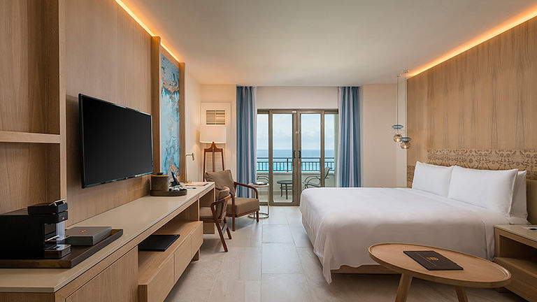 Guestrooms take inspiration from the colors of the region.