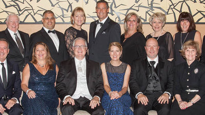 Ensemble executives and the co-op’s board of directors at the Circle of Excellence black-tie gala on Oct. 21. // © 2016 Ensemble Travel Group