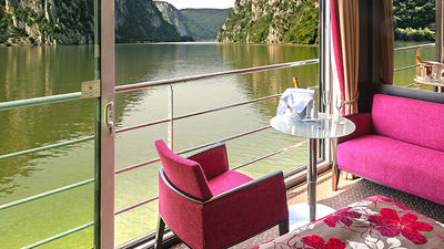 Avalon Waterways’ online videos show beds facing wall-to-wall open-air balconies. // © 2015 Globus Family of Brands