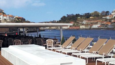 Queen Isabel’s sun deck offers beautiful views of the passing Portuguese countryside. // © 2013 Uniworld Boutique River Cruise Collection F