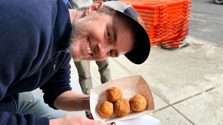David Frasure starts the tour strong with arancini from Faicco’s Italian Specialties.
