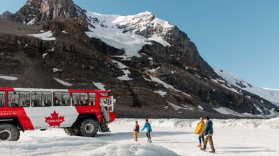 On the Columbia Icefield Adventure tour, travelers can set foot on a glacier and even sip glacial water.