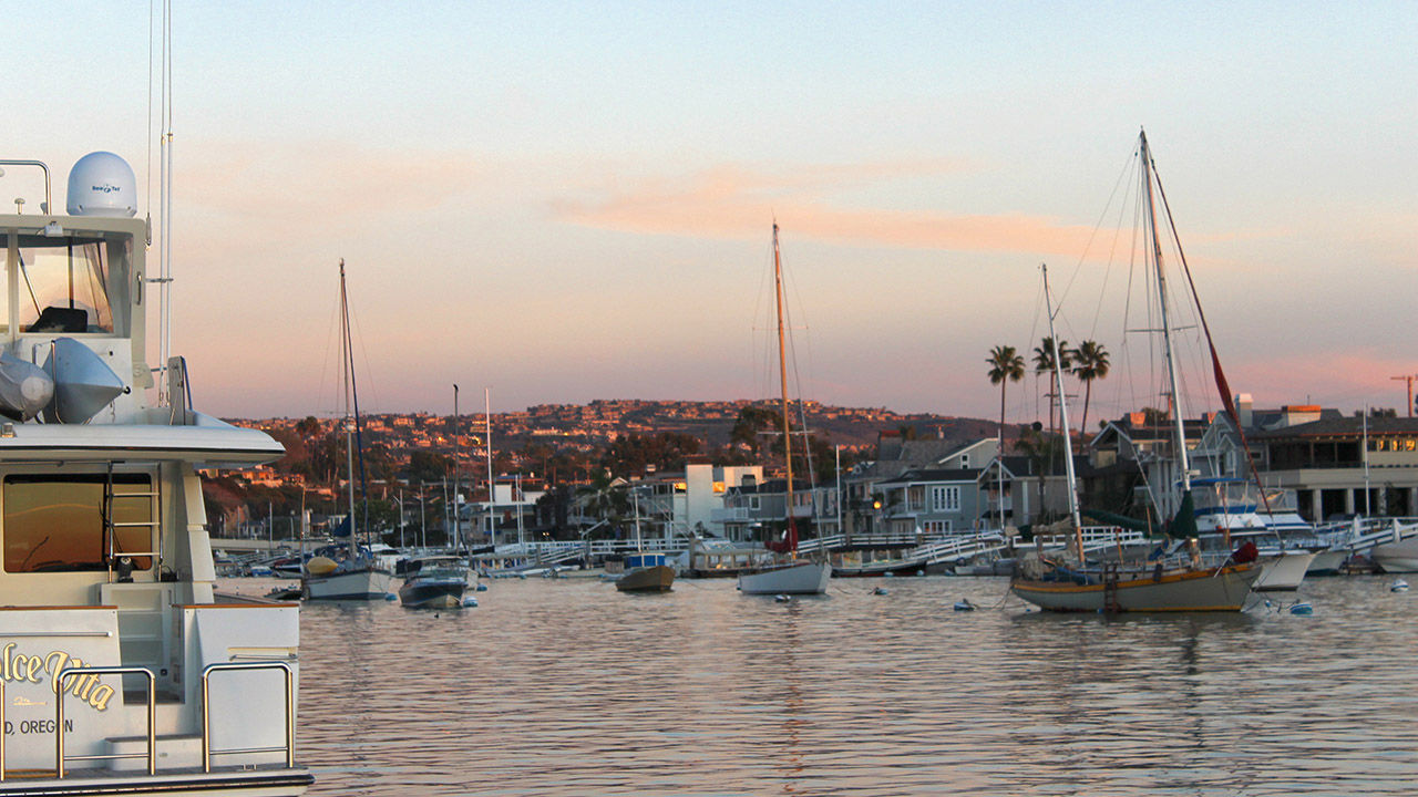 The Newport Harbor is known for its bustling, large and boat-filled bay.