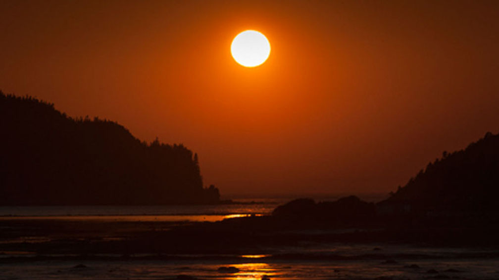 Sunset over the St. Lawrence River and Bic National Park in Quebec’s maritime region // 2013 Mark Edward Harris F