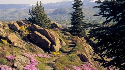 With its colorful flowers, towering evergreens and stone walkways, Ohme Gardens provides stellar views of Wenatchee and surrounding mountains. // © 2016 Wenatchee Valley Chamber of Commerce