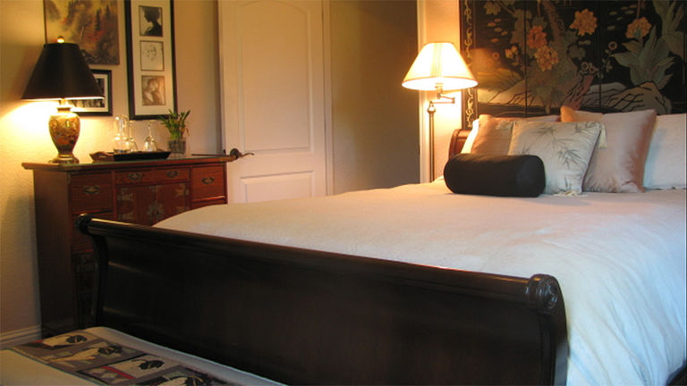 The Mary Room is named after the second-oldest daughter and features Victorian mahogany furniture, Asian paintings and soft colors and lighting.