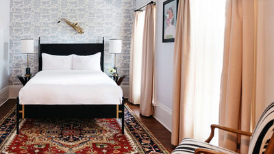 Henry Howard Hotel's guestrooms mix the traditional with the modern, featuring local artwork and instruments used by the city’s brass bands. // © 2017 Henry Howard Hotel