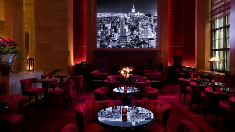 The sophisticated lobby bar offers a curated menu that traces the history of Manhattan through the decades.