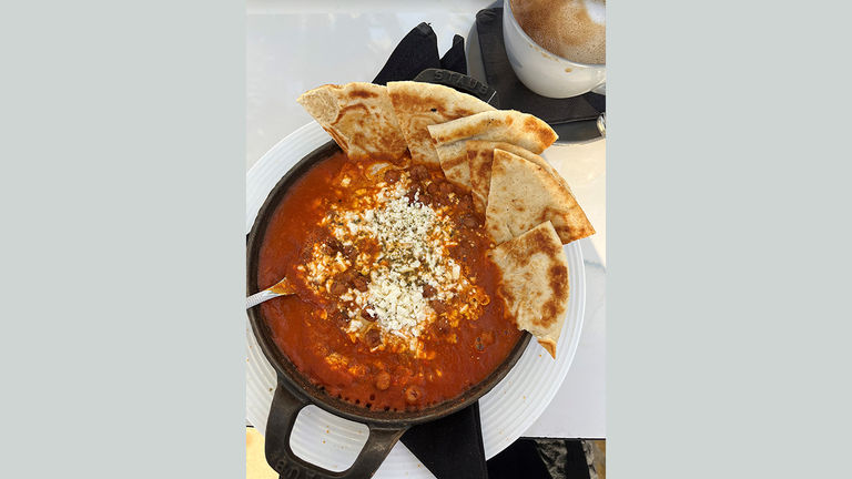 Breakfast items, such as homemade shakshuka, are available at Goat Tree restaurant.
