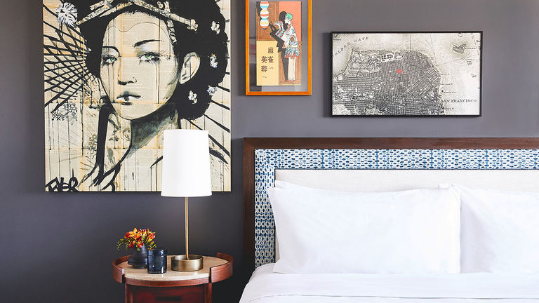 Guestrooms feature a minimalist yet artful design.