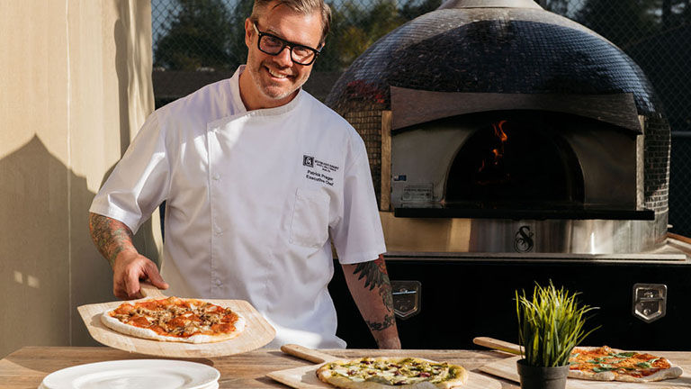 Forno Pizza at The Market serves pies from an outdoor pizza oven.
