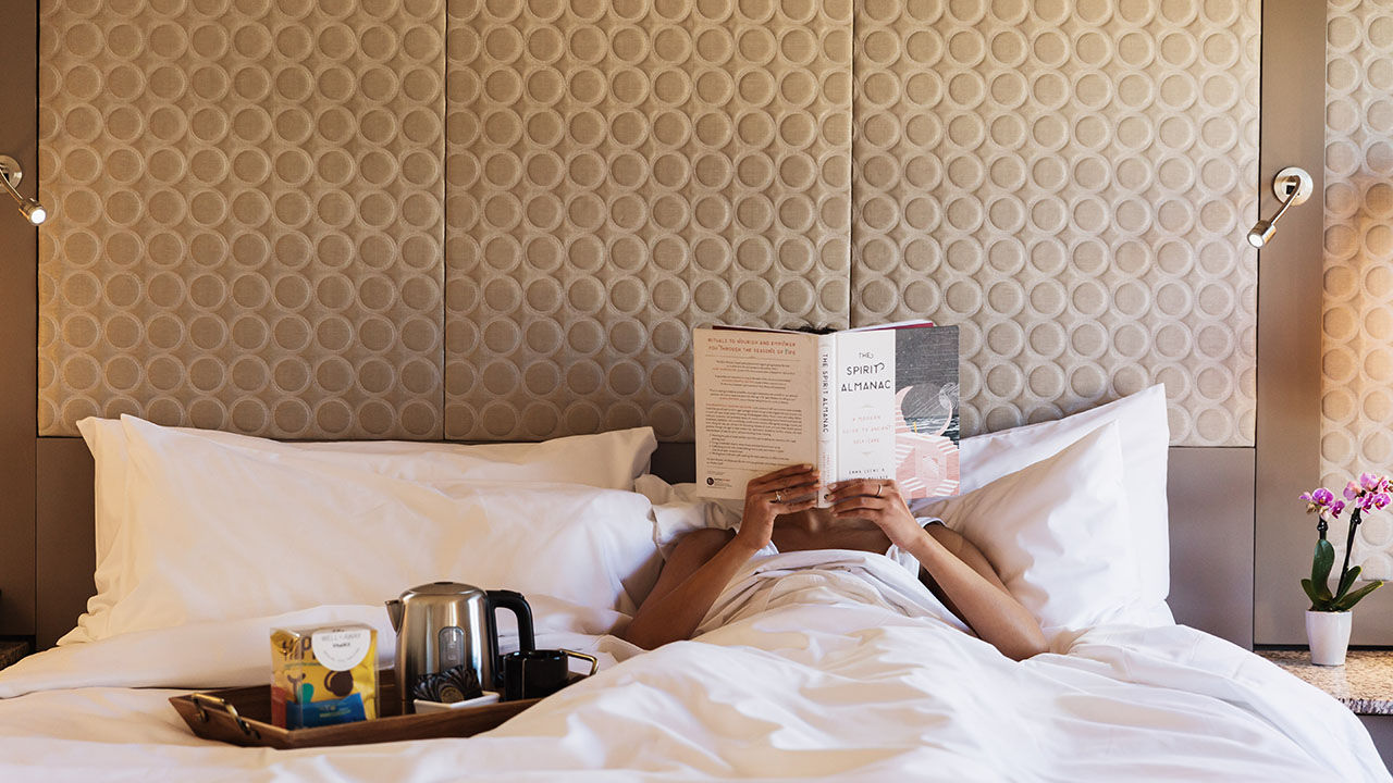 The new Urban Sanctuary Experience provides amenities including healthful snacks, CBD tea, access to meditation and fitness apps, in-room plants, athletic gear lending and more.