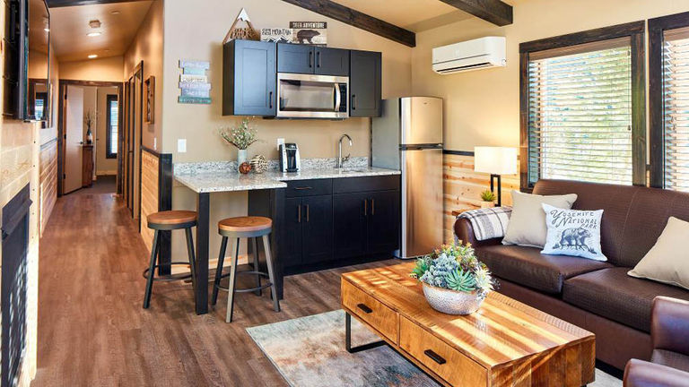 Explorer Cabins offer a mixed-use living room and kitchenette.