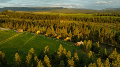 Set on 37,000 acres of land in Montana, The Resort at Paws Up includes 31 stand-alone luxury cabins and three dozen fully furnished, safari-style tents.