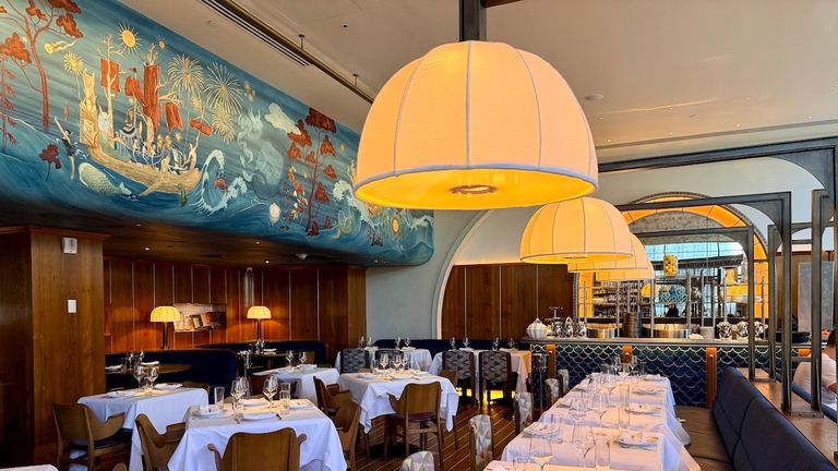 The Seahorse seafood brasserie features a mural that honors New York’s seafaring history.
