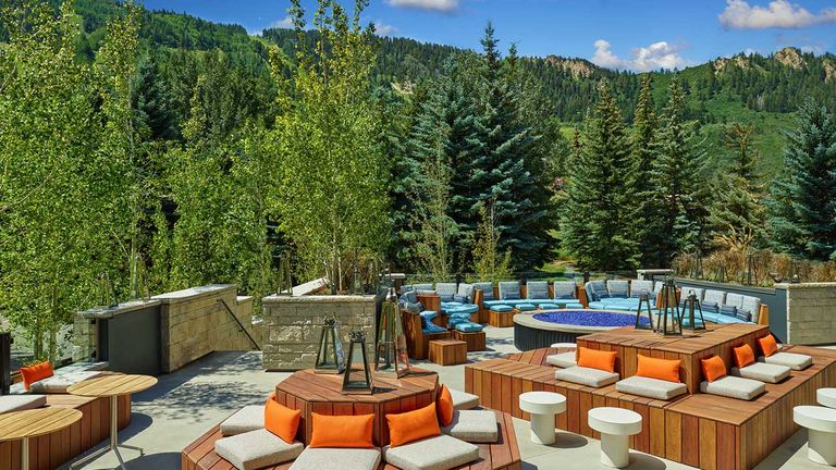 The Living Room’s outdoor terrace is nestled among Aspen trees.