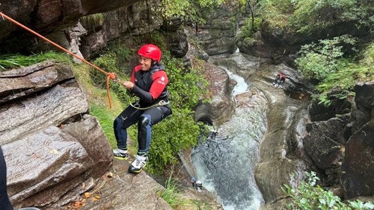 Event attendees participated in various activities, such as canyoneering in Iragna Canyon.