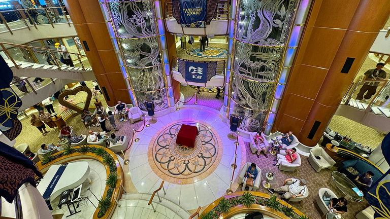 Guests can hang out in the ship’s impressive Grand Plaza.