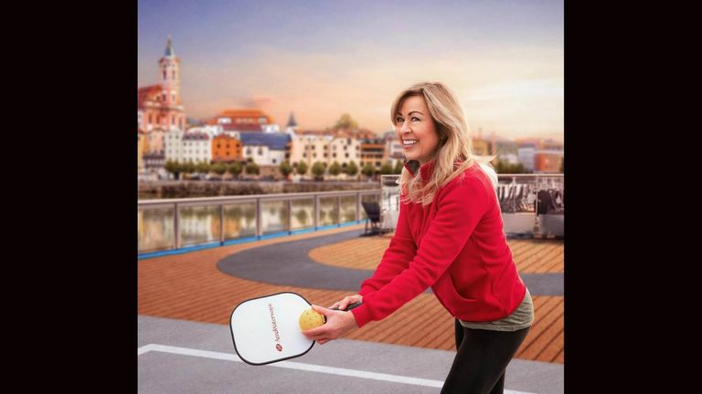 Kristin Karst, co-founder and chief brand ambassador for AmaWaterways, plays pickleball while cruising in Passau, Germany