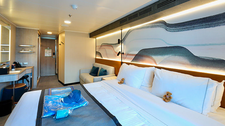 A balcony stateroom onboard Aqua