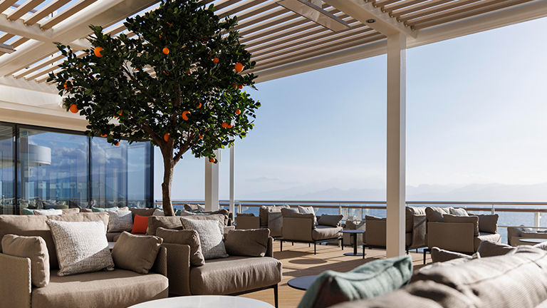 Shaded alcoves provide a resort-style feel onboard the ship.
